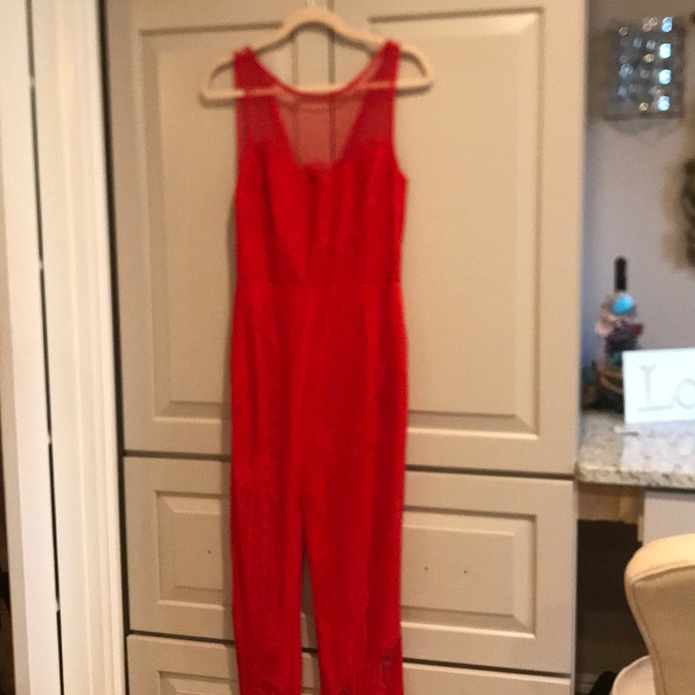 NBD red lace jumpsuit from Revolve.